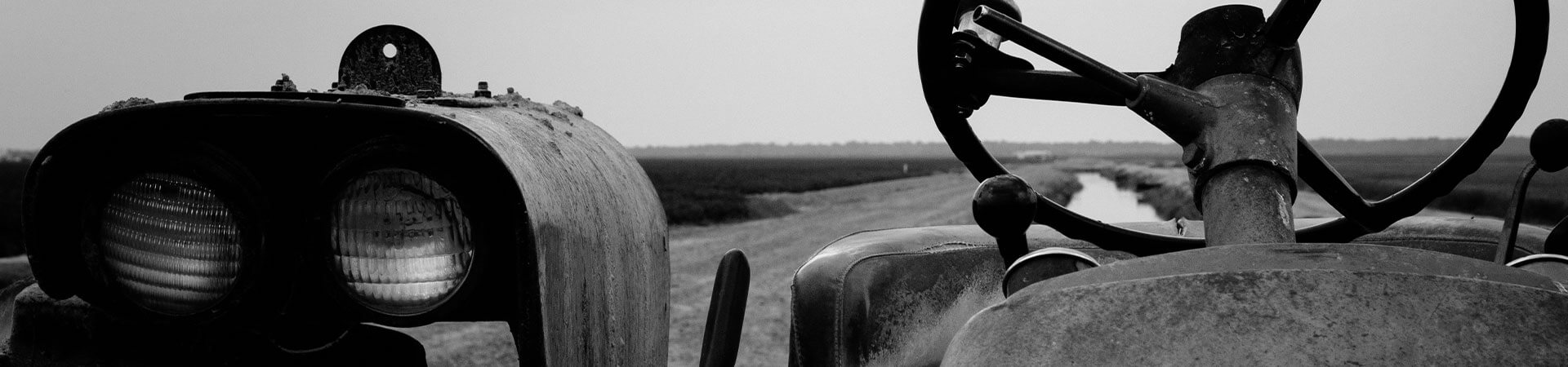 Black and white image of a vintage tractor.